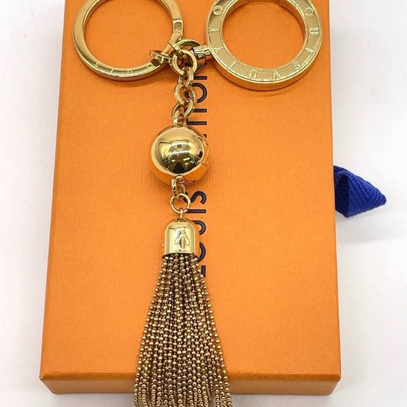 Auth Louis Vuitton Portecle Gold Color
Key Ring/Holder W/Box - Picture 2 of 10